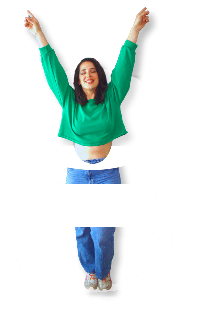 Gina Bley posing in a green jumper with blue jeans, surrounded by a graphic "G" in white