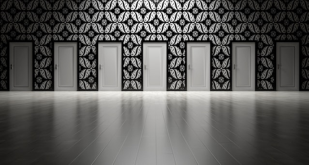 Image for the article "Dealing with Change" shows a room with black and white wall and many doors leading somewhere